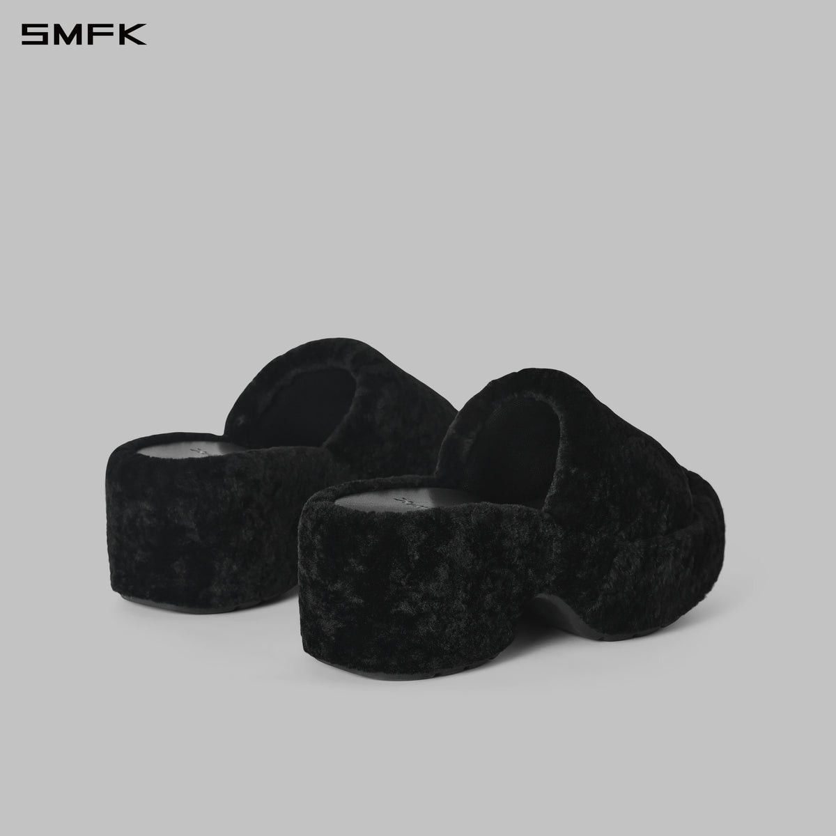 PRISM WORLD SHEARLING HEELED SLIDES WILD BLACK