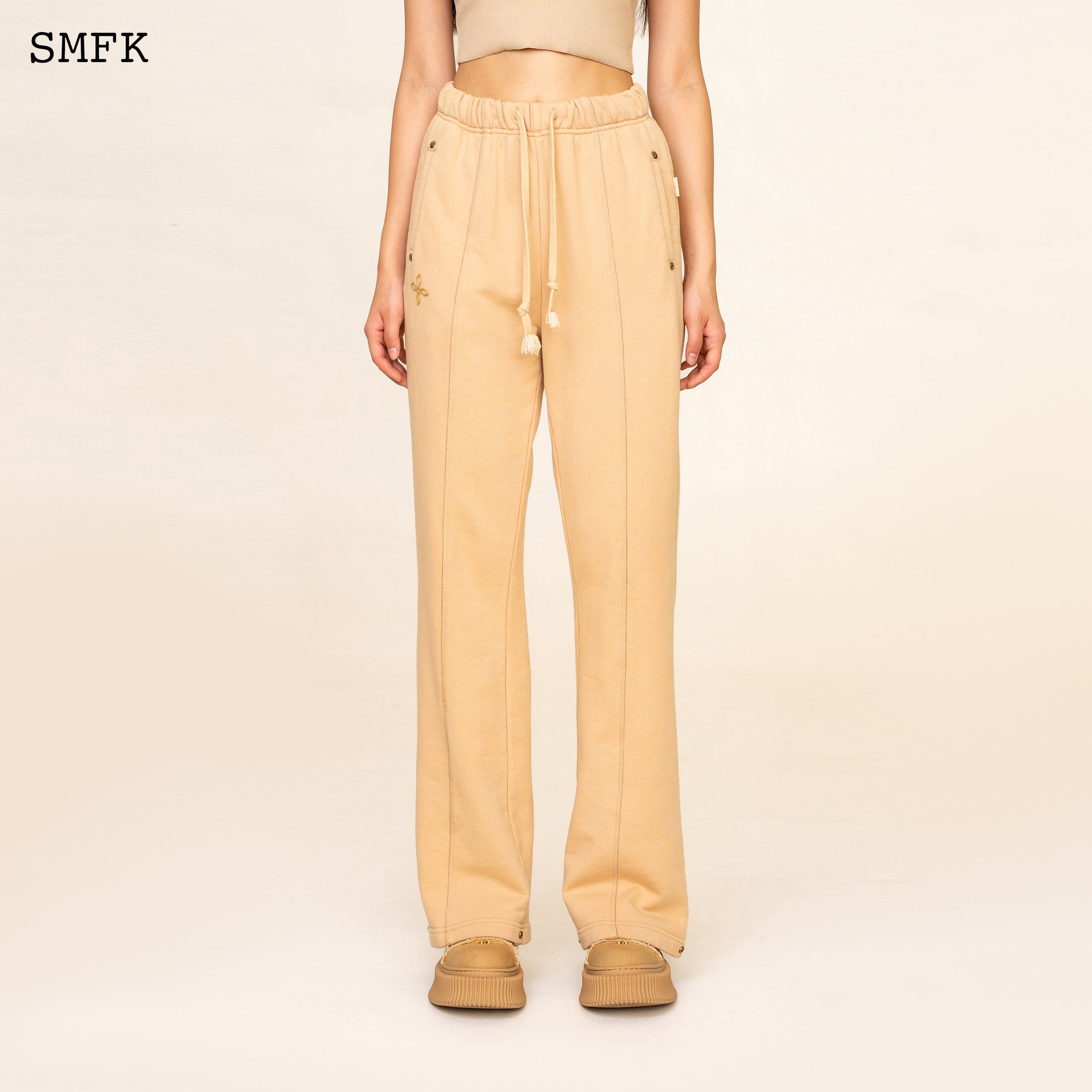 Compass Classic Cross Flared Sweatpants In Wheat - SMFK Official
